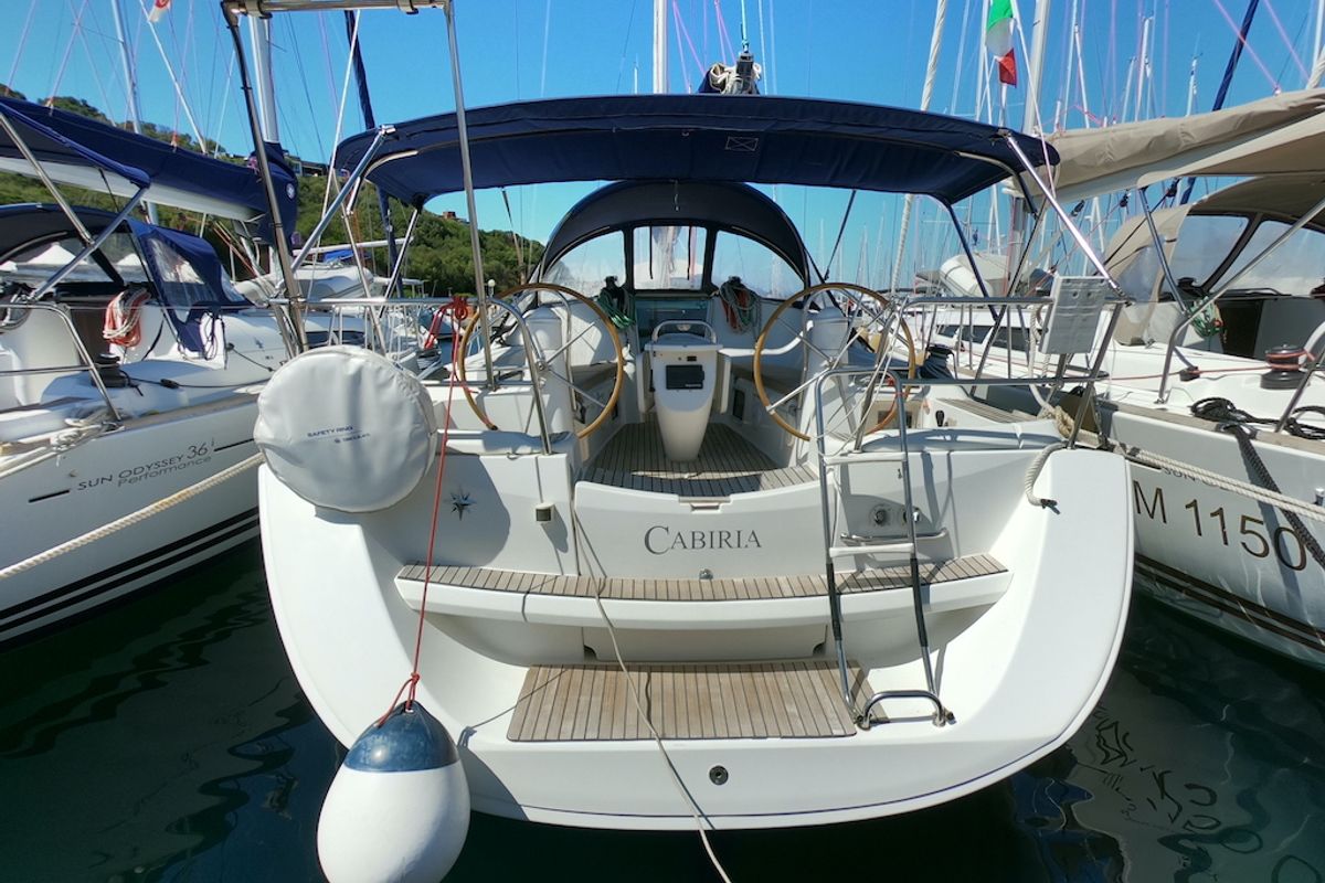 Exterior view of Cabiria, a Jeanneau Sun Odyssey 39i sailboat at Olbia, Italy