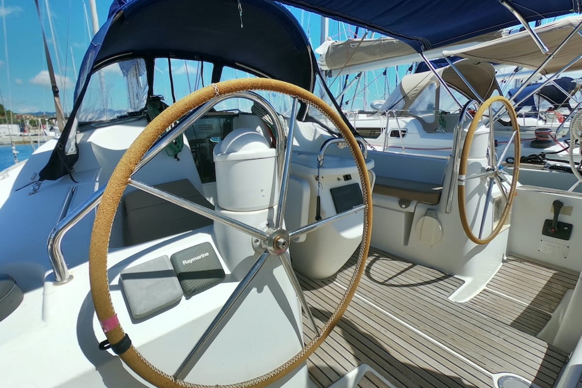 Cockpit of Cabiria, a Jeanneau Sun Odyssey 39i sailboat at Olbia, Italy