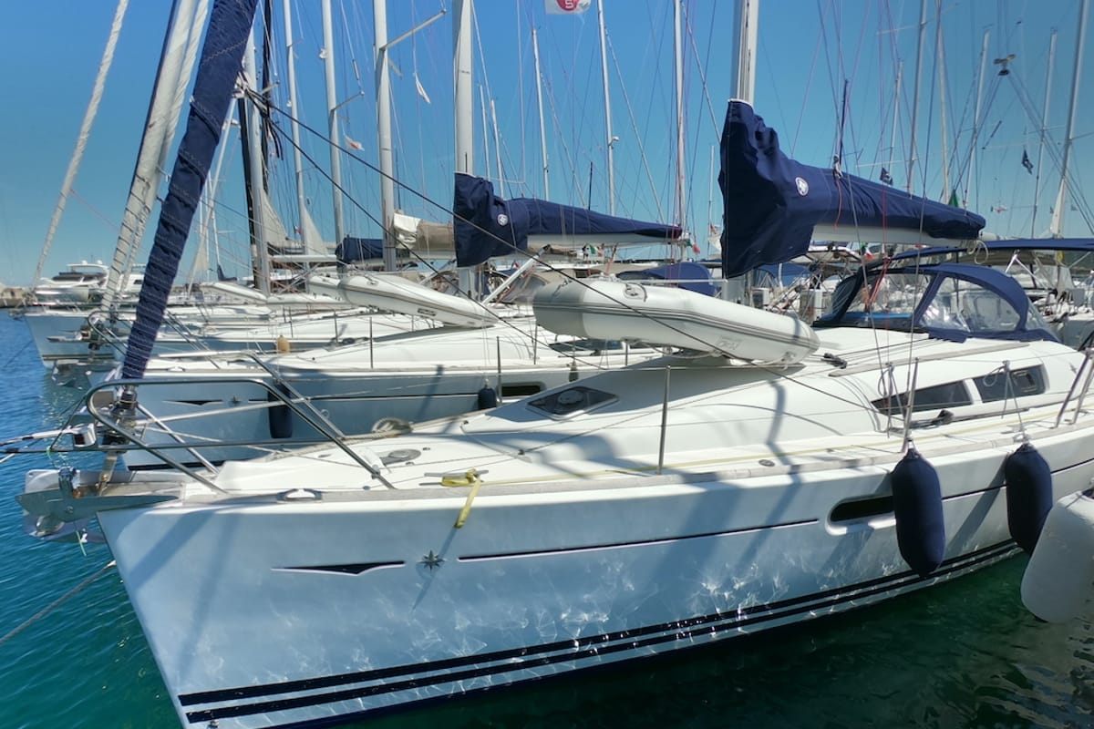 Exterior view of Cabiria, a Jeanneau Sun Odyssey 39i sailboat at Olbia, Italy