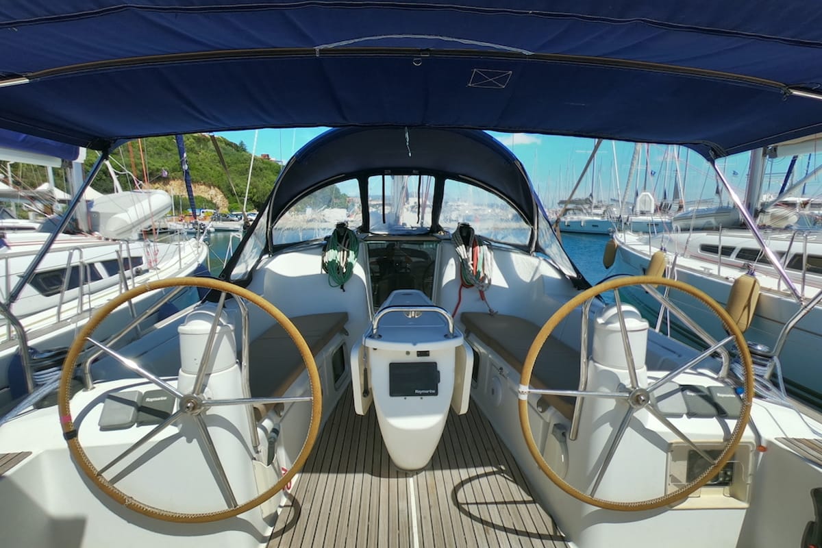 Cockpit of Cabiria, a Jeanneau Sun Odyssey 39i sailboat at Olbia, Italy