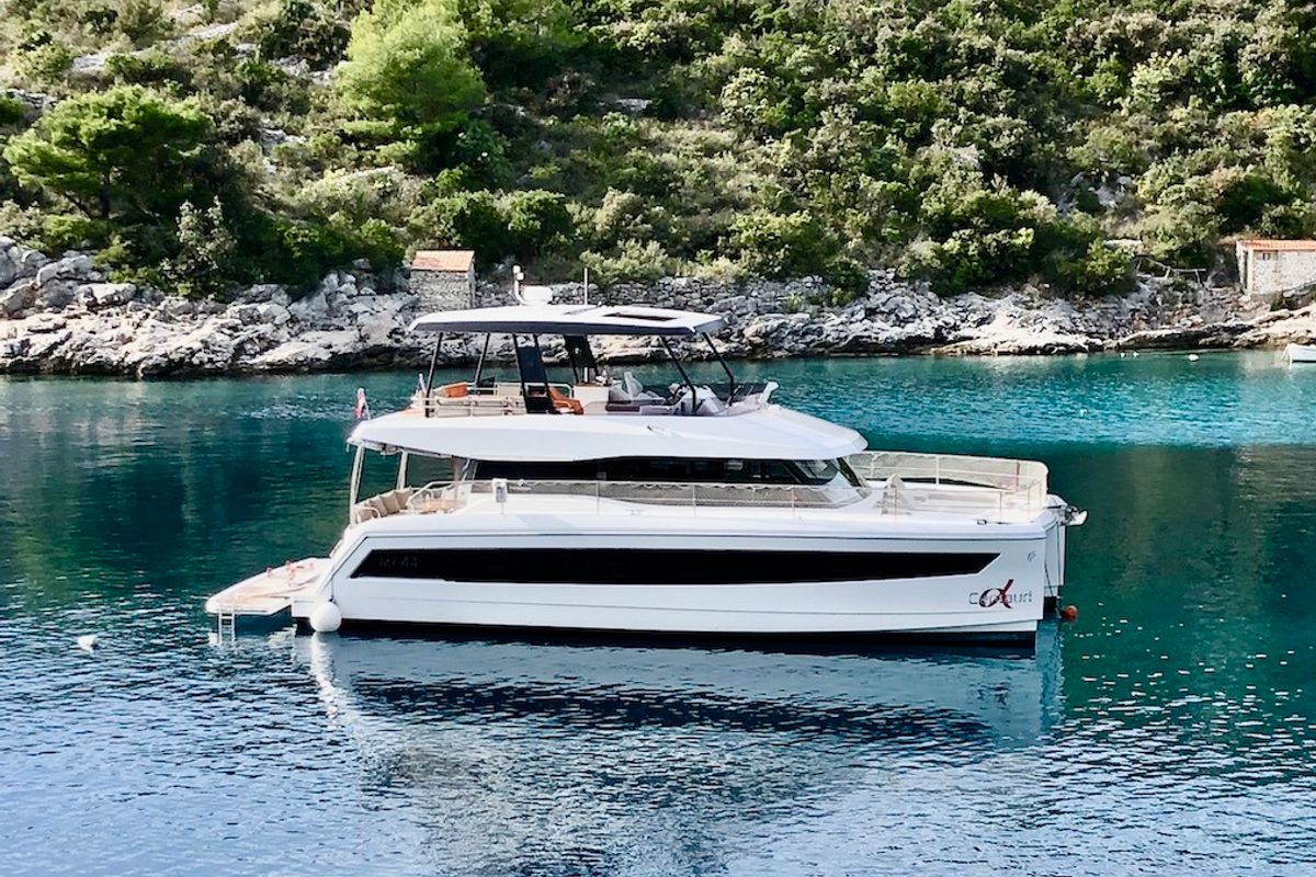 Exterior view of Alpha Centauri, a Fountaine Pajot MY44 catamaran at Grad Šibenik, Croatia