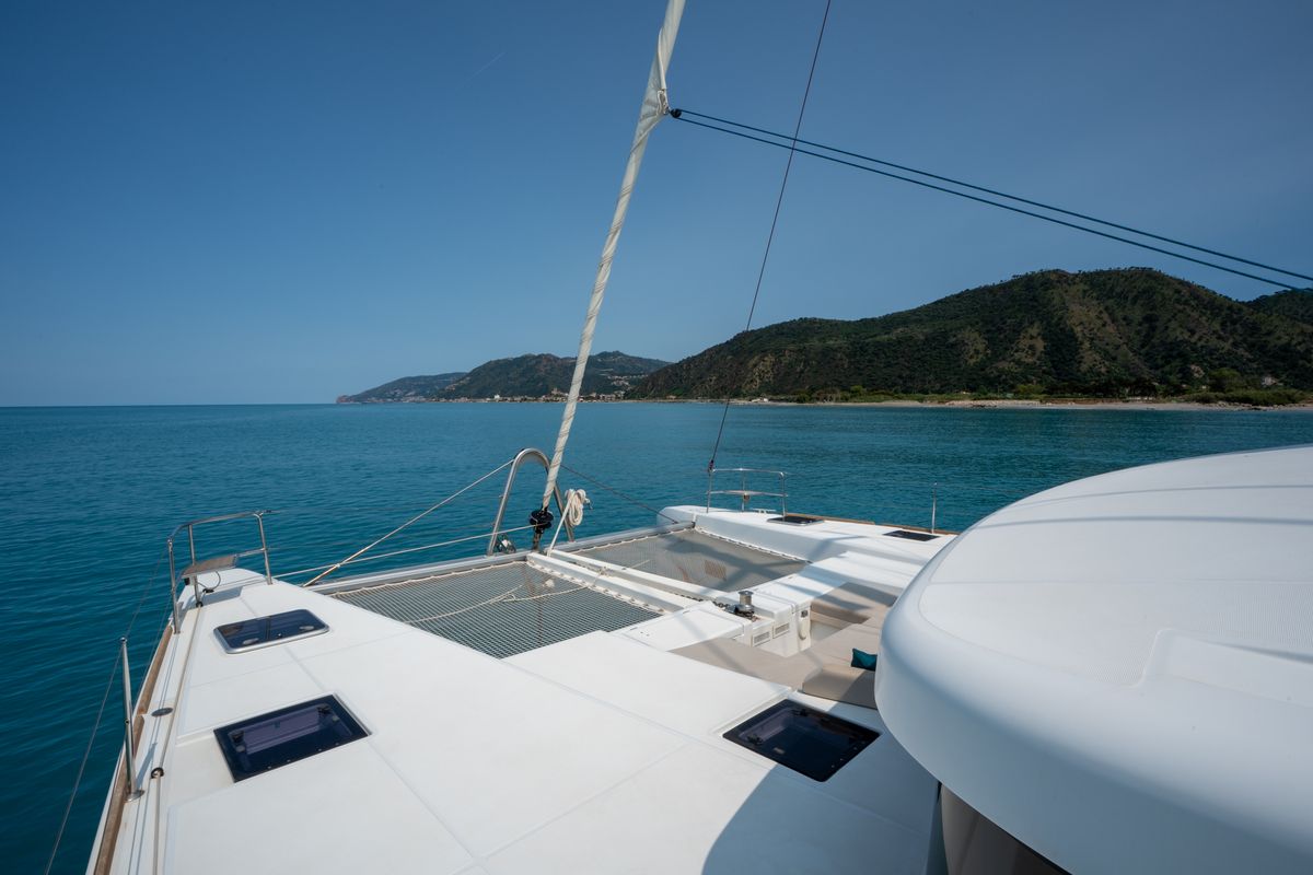 Exterior view of SAILUXE - Fichissimo, a Lagoon 52F catamaran at Capo d'Orlando, Italy