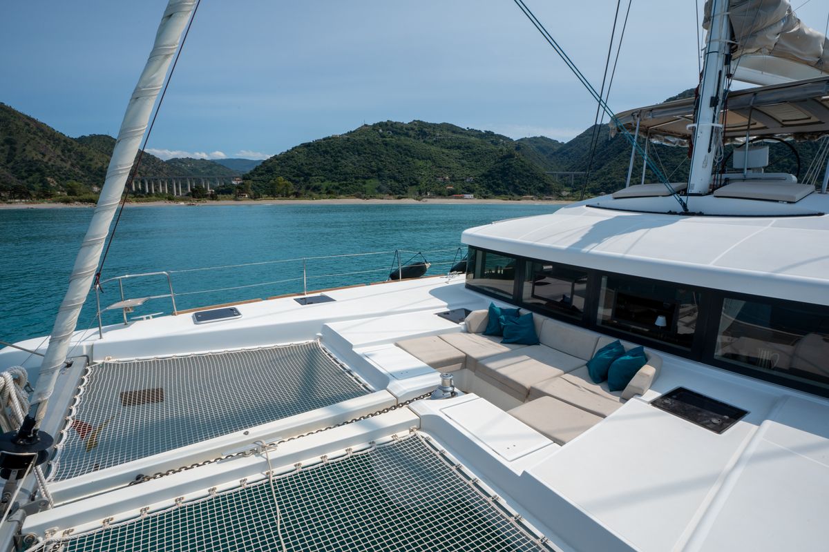 Exterior view of SAILUXE - Fichissimo, a Lagoon 52F catamaran at Capo d'Orlando, Italy