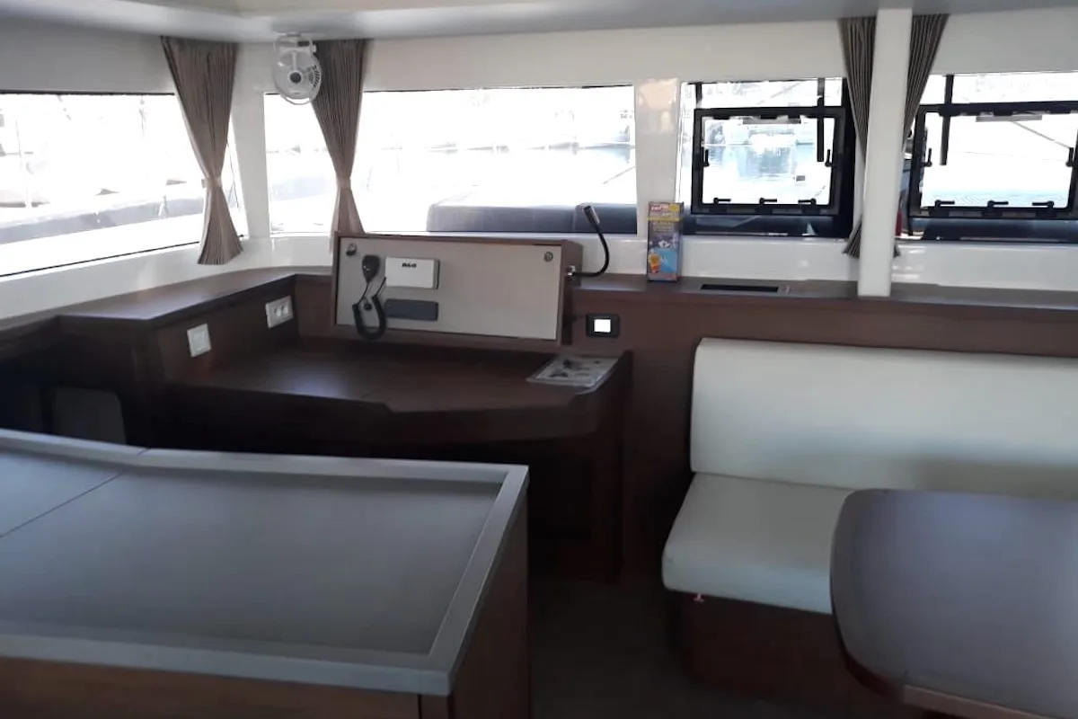Salon of Escapade, a Lagoon 450 Fly catamaran at Athens, Greece