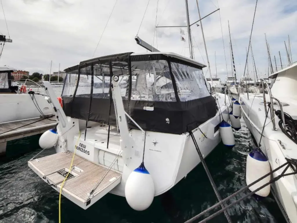 Exterior view of New Horizons II, a Jeanneau Sun Loft 47 sailboat at La Favière, France