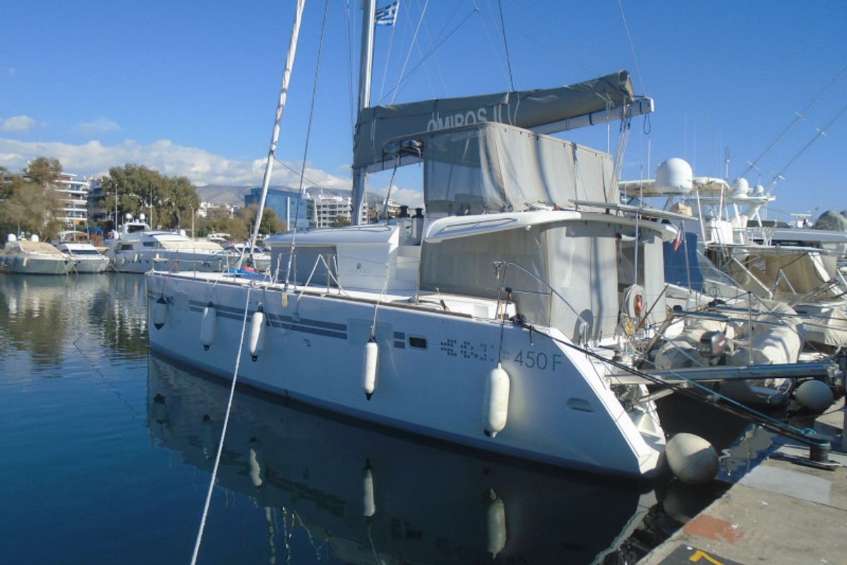 Exterior view of Omiros II, a Lagoon 450 Fly catamaran at Athens, Greece