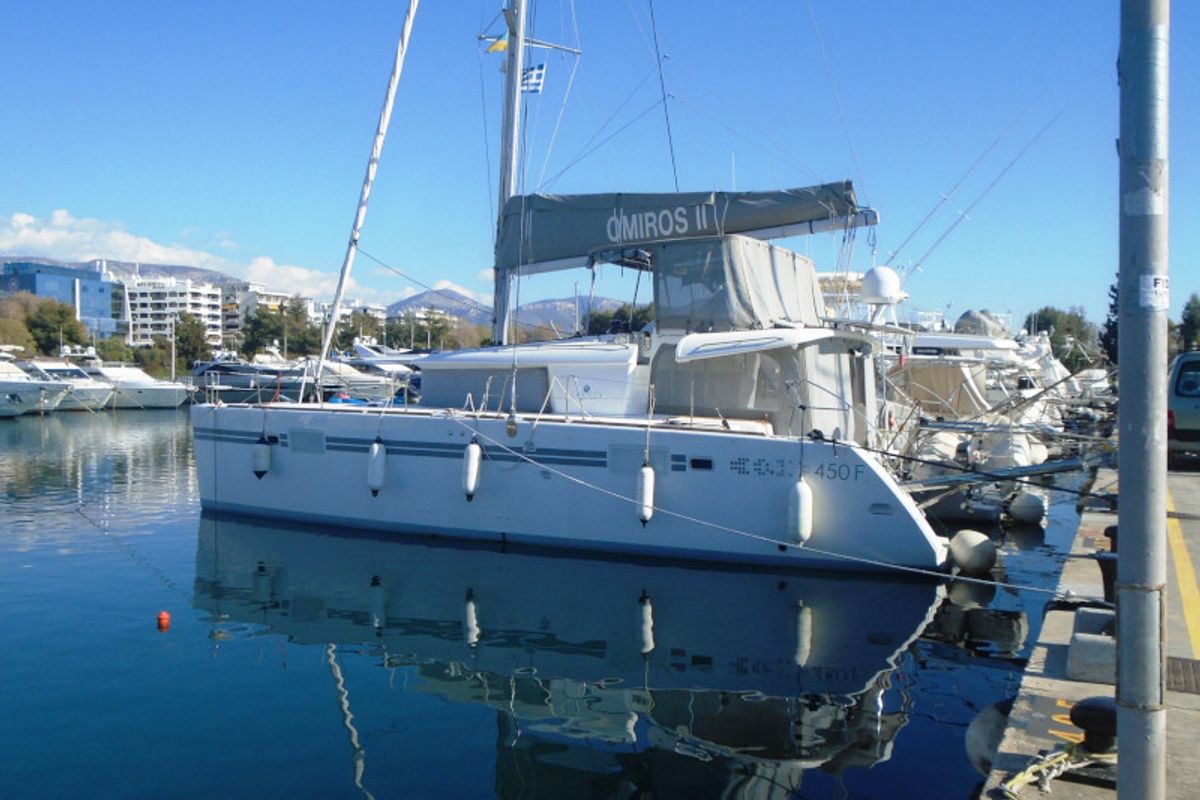 Exterior view of Omiros II, a Lagoon 450 Fly catamaran at Athens, Greece