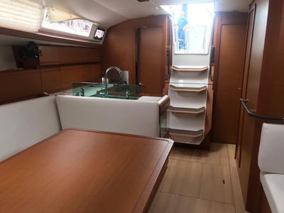 Salon of Alboran Limoncello (Majorca), a Jeanneau Sun Odyssey 419 sailboat at es Jonquet, Spain