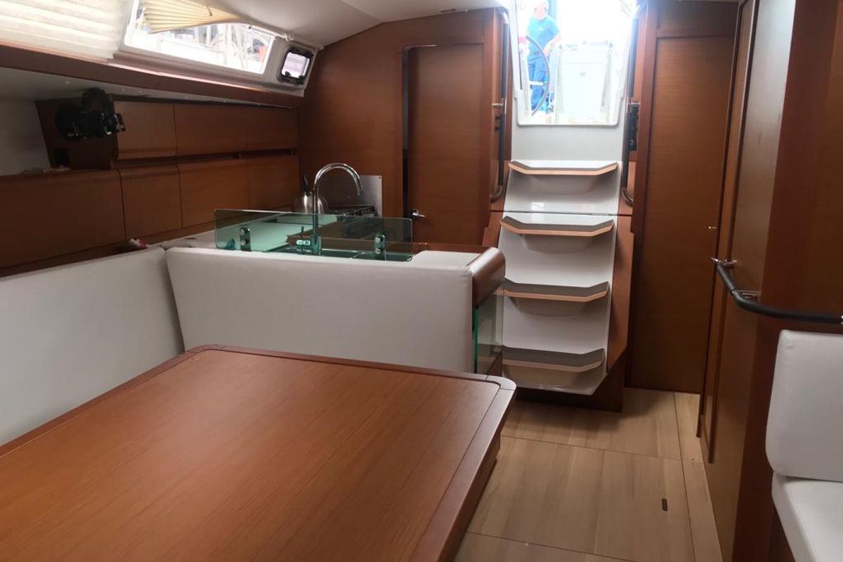 Salon of Alboran Limoncello (Majorca), a Jeanneau Sun Odyssey 419 sailboat at es Jonquet, Spain