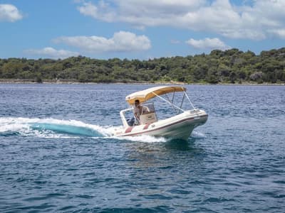 Exterior view of 281744ML, a Barracuda 530 RIB motorboat at Mali Lošinj, Croatia