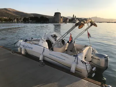 Exterior view of Beneteau Flyer 550 SUNdeck, a Beneteau Flyer 550 motorboat at Grad Trogir, Croatia