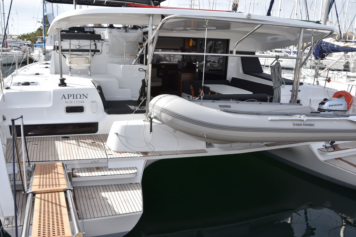 Exterior view of ARION AC, Gen, W.Maker, a Lagoon 42 catamaran at Skiathos, Greece