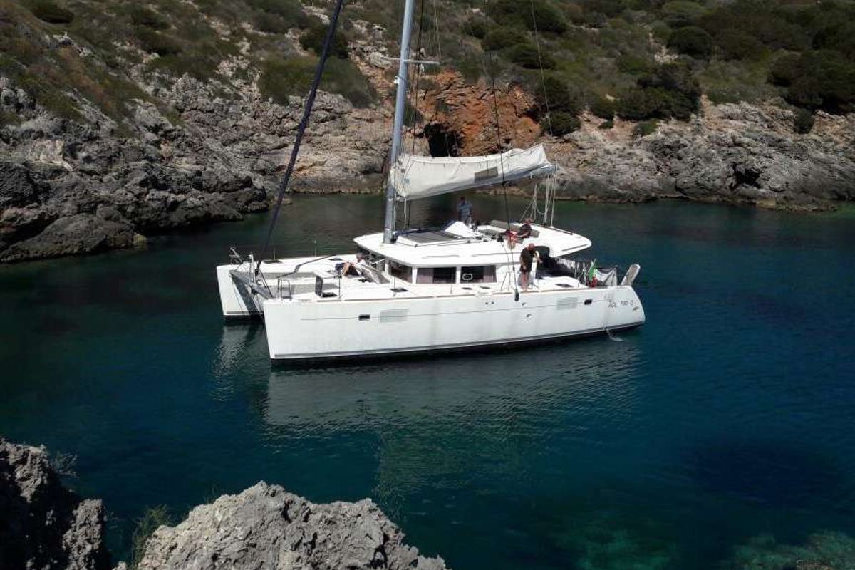 Exterior view of Opera Prima, a Lagoon 450 catamaran at Capo d'Orlando, Italy