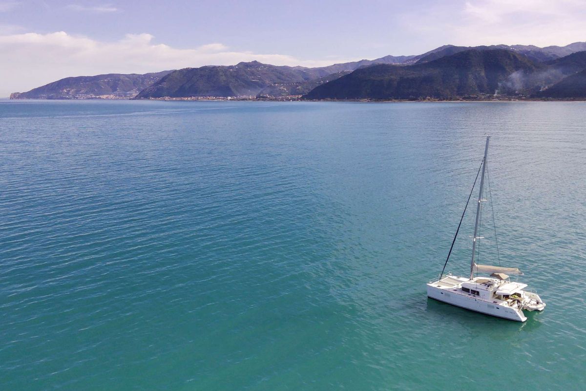 Exterior view of Opera Prima, a Lagoon 450 catamaran at Capo d'Orlando, Italy