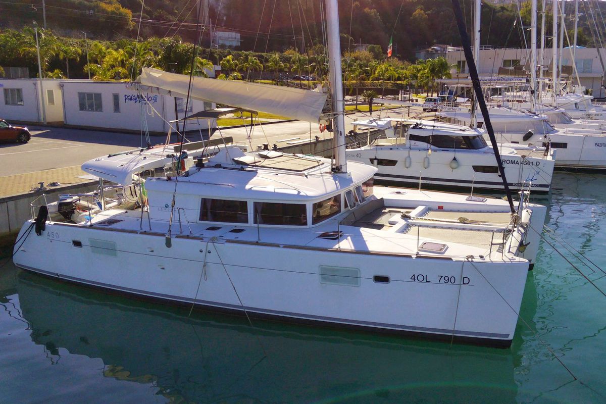 Exterior view of Opera Prima, a Lagoon 450 catamaran at Capo d'Orlando, Italy