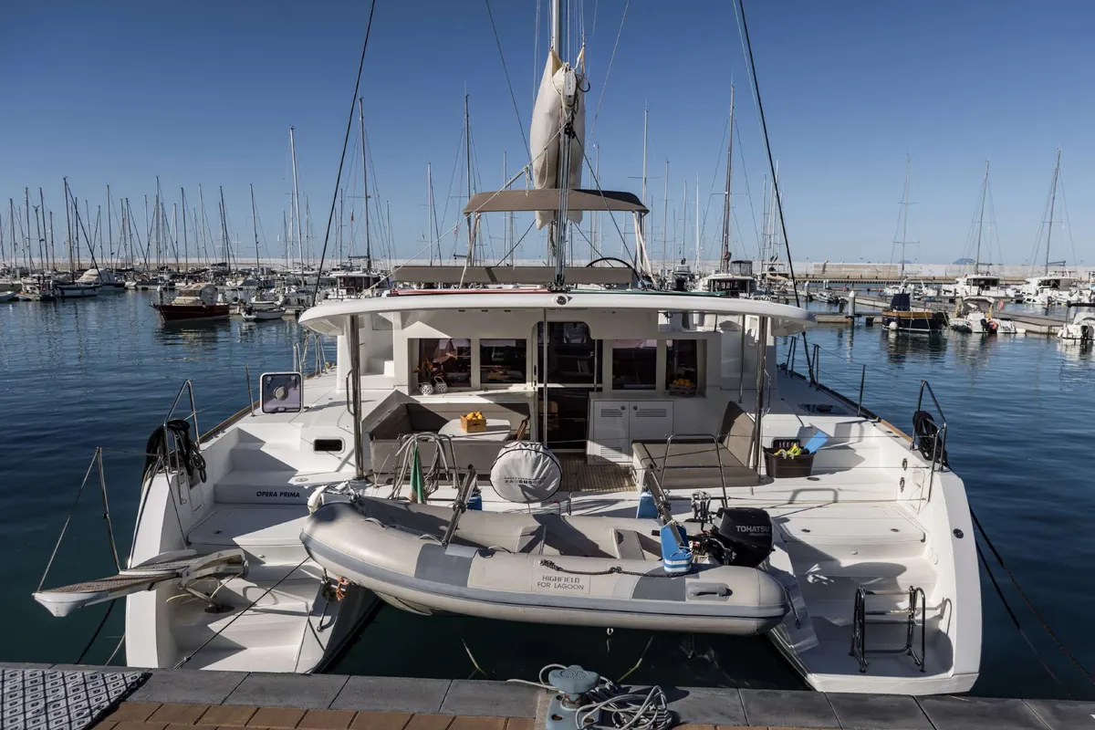Exterior view of Opera Prima, a Lagoon 450 catamaran at Capo d'Orlando, Italy