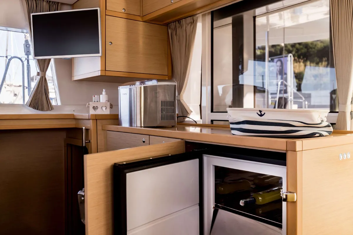 Salon of Opera Prima, a Lagoon 450 catamaran at Capo d'Orlando, Italy