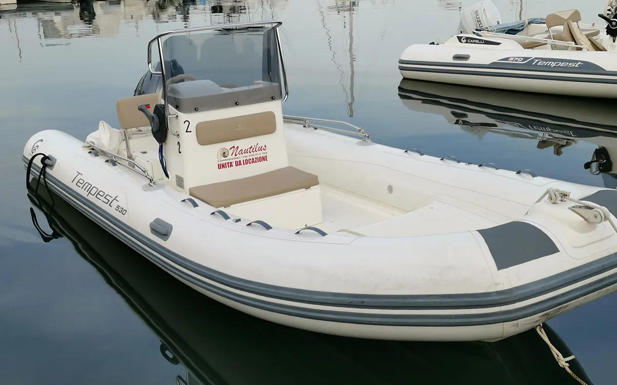 Deck of n. 2, a Capelli Tempest 530 rib at Cannigione, Italy