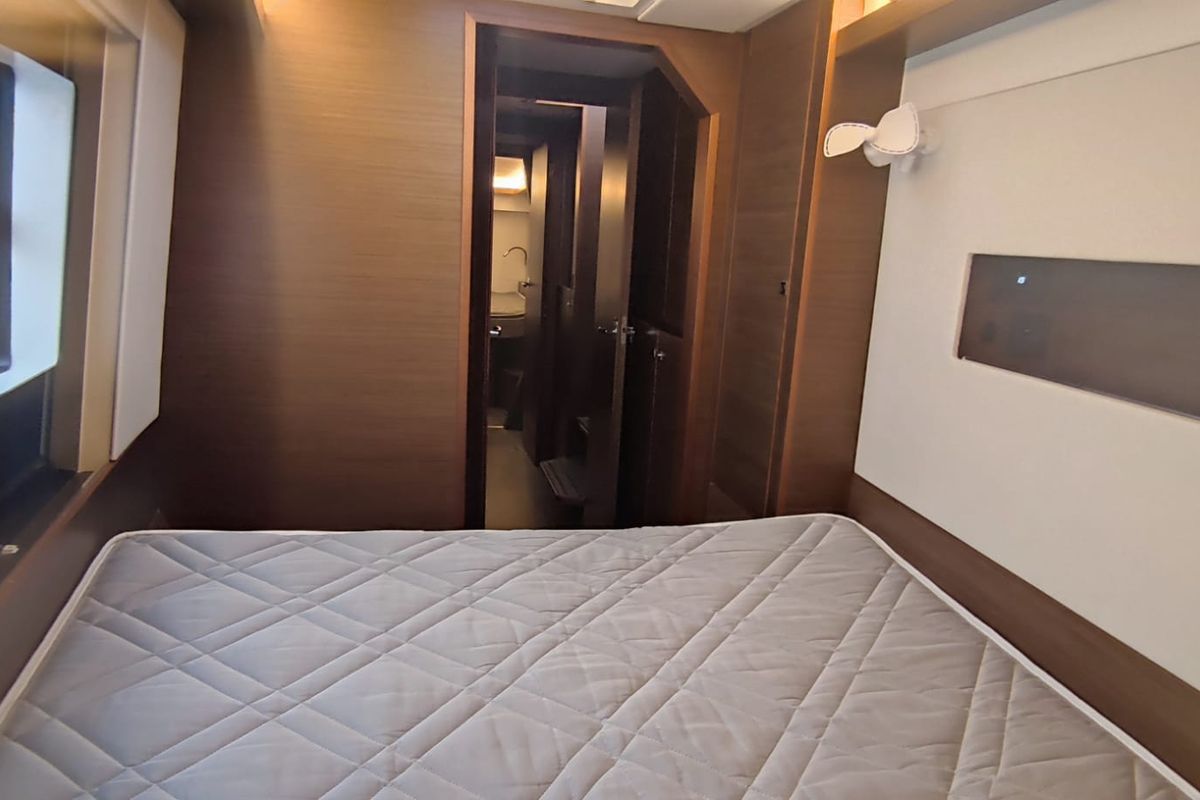 Cabin on Sardinia , a Nautitech 46 Fly catamaran at Cagliari, Italy