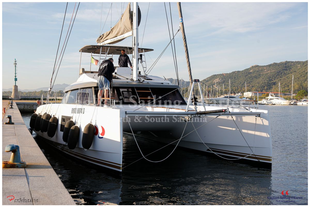 Exterior view of Sardinia , a Nautitech 46 Fly catamaran at Cagliari, Italy
