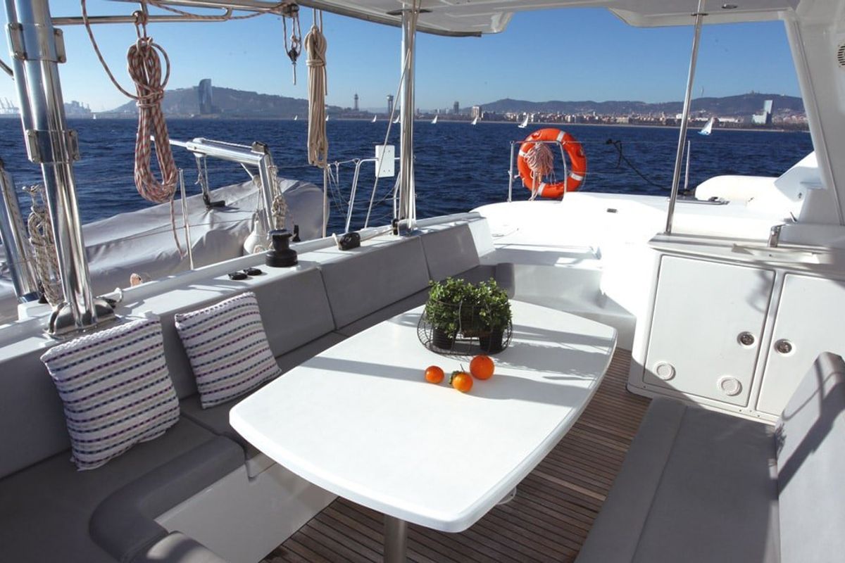 Exterior view of Atlantis, a Lagoon 440 catamaran at Santa Eulària des Riu, Spain