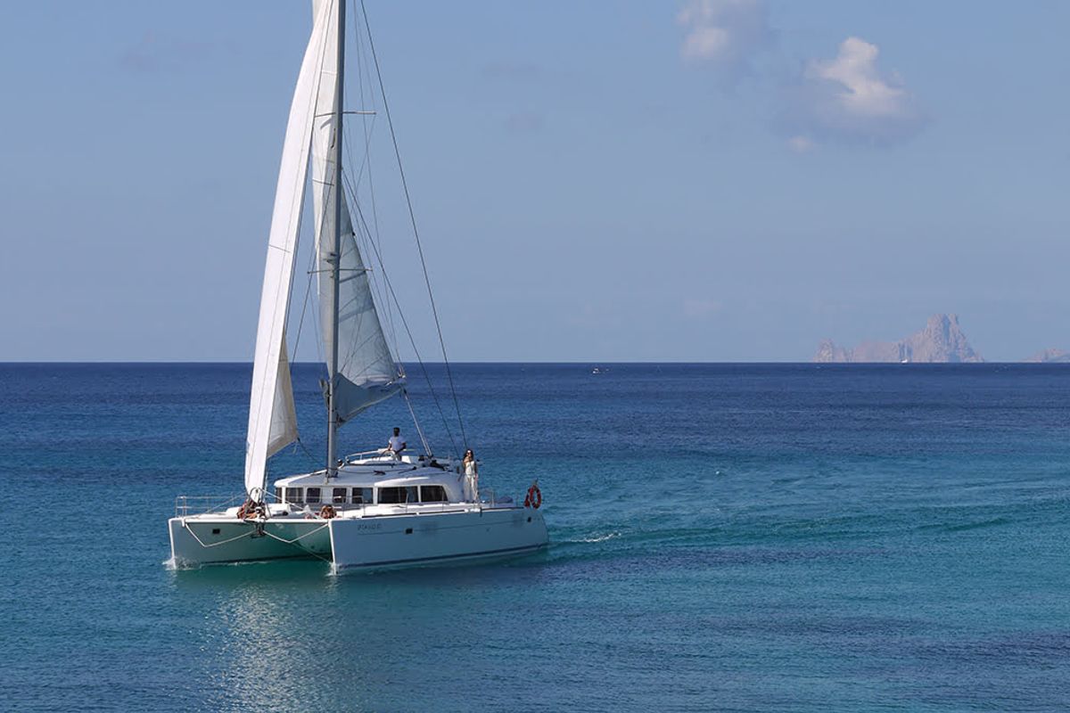 Exterior view of Atlantis, a Lagoon 440 catamaran at Santa Eulària des Riu, Spain