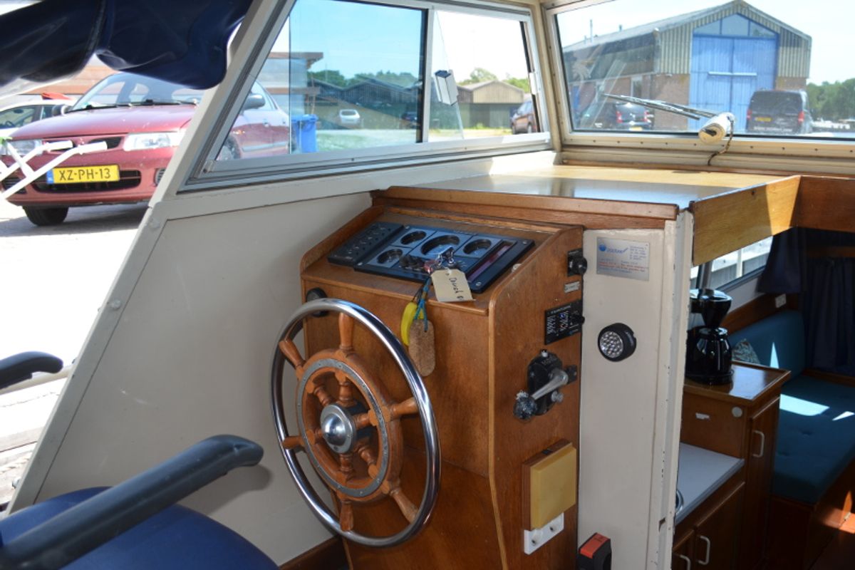 Cockpit of South Pacific, a De Drait Doerak 850 OK motorboat at Drachten, Netherlands