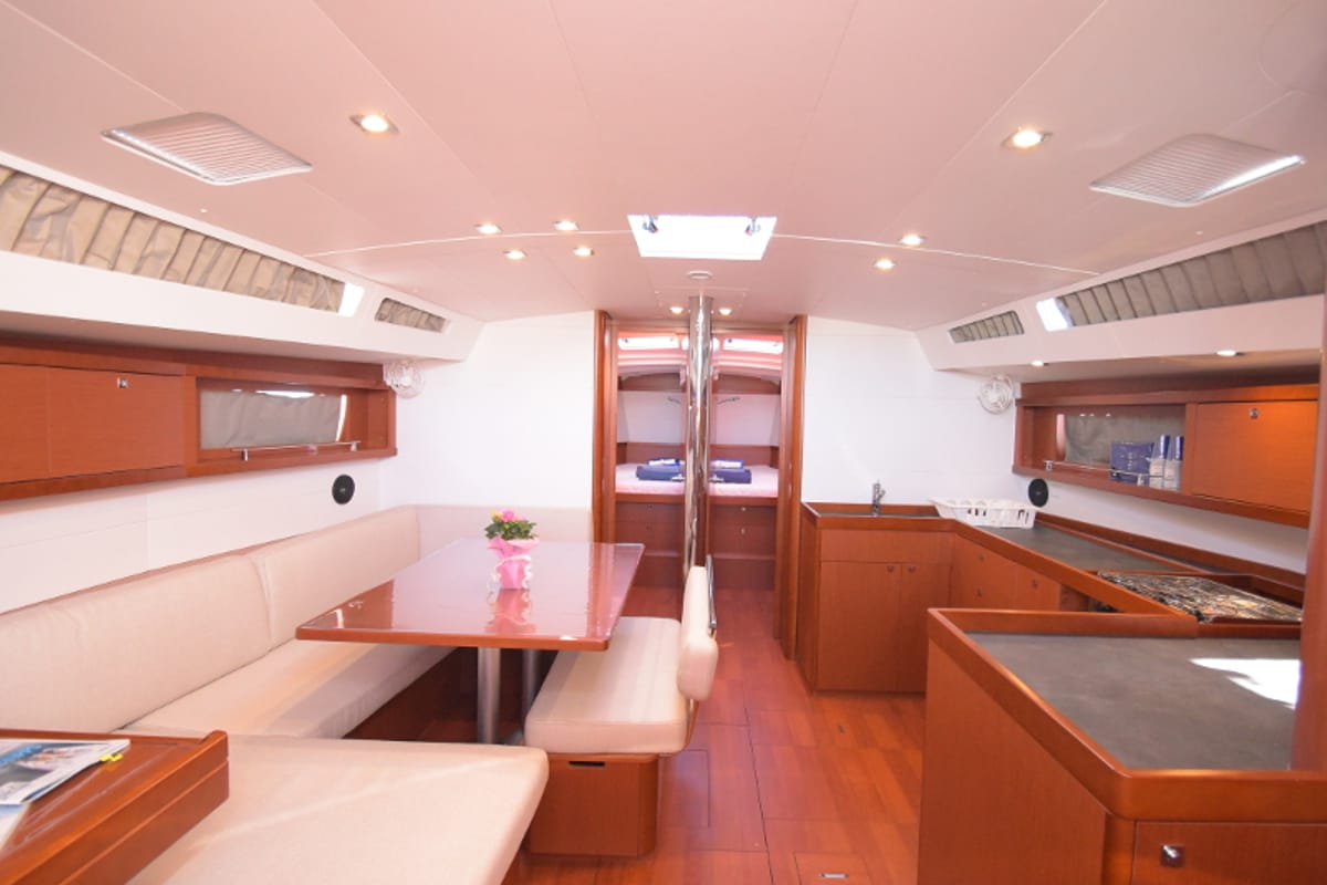 Salon of Allegra, a Beneteau Oceanis 48 sailboat at U Pàize/Carloforte, Italy