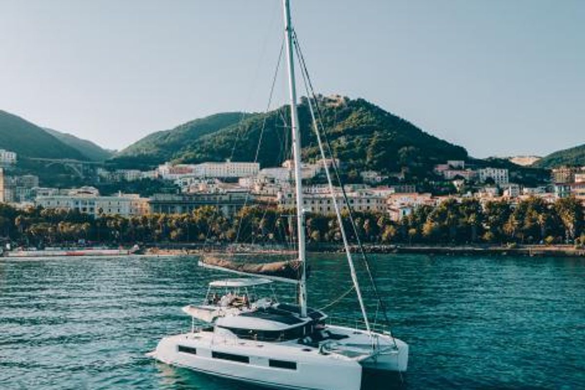 Exterior view of Lady G, a Lagoon 51 catamaran at Salerno, Italy