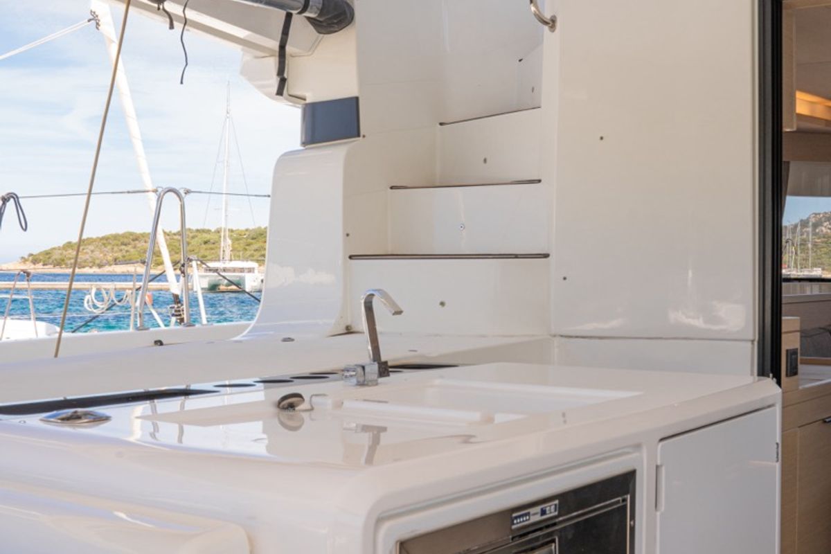 Exterior view of Chilli, a Lagoon 55 catamaran at Olbia, Italy