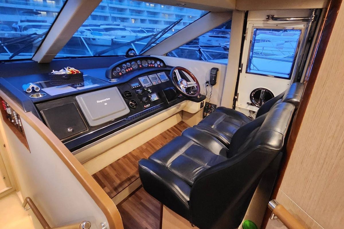 Cockpit of Sassy, a Princess Yachts Princess 62 yacht at Lavreotiki Municipal Unit, Greece