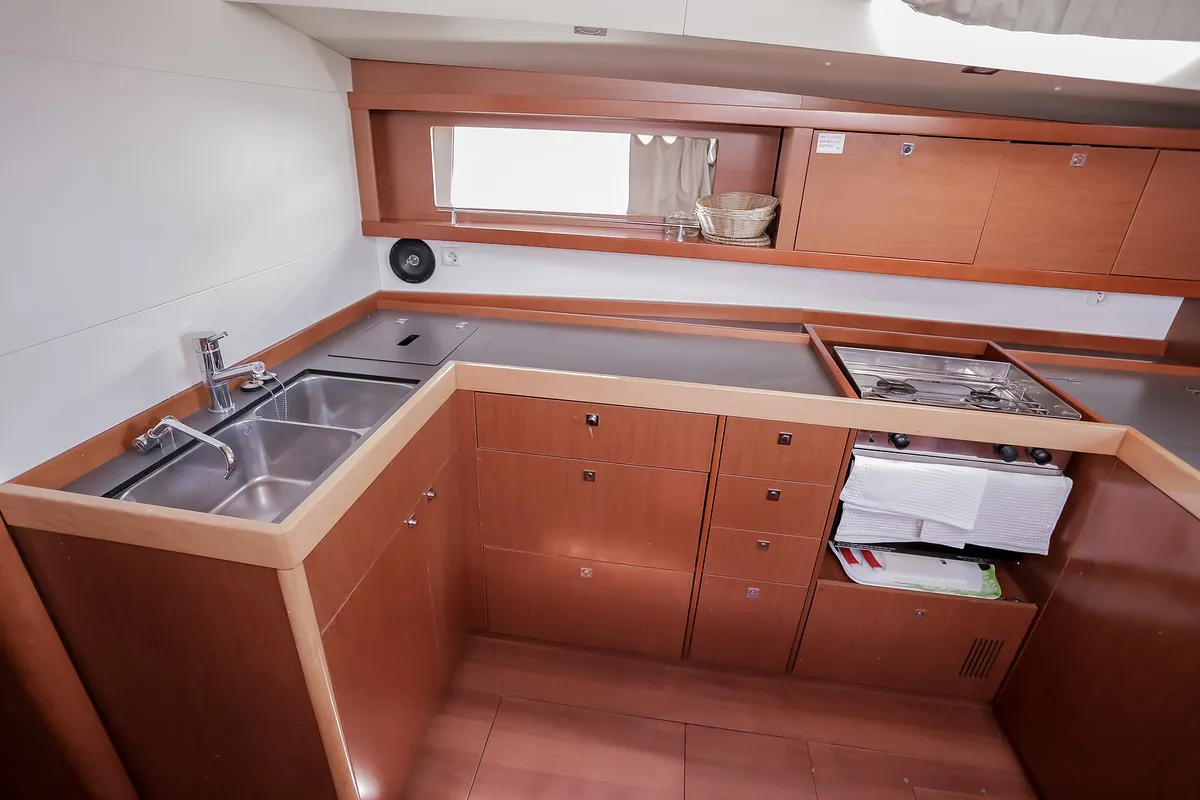 Galley of Nabucco: Forward Cabin #1 (Cabin Charter - 2 pax) Fully Crewed, ALL EXPENSES, a Beneteau Oceanis 48 sailboat at Gr…