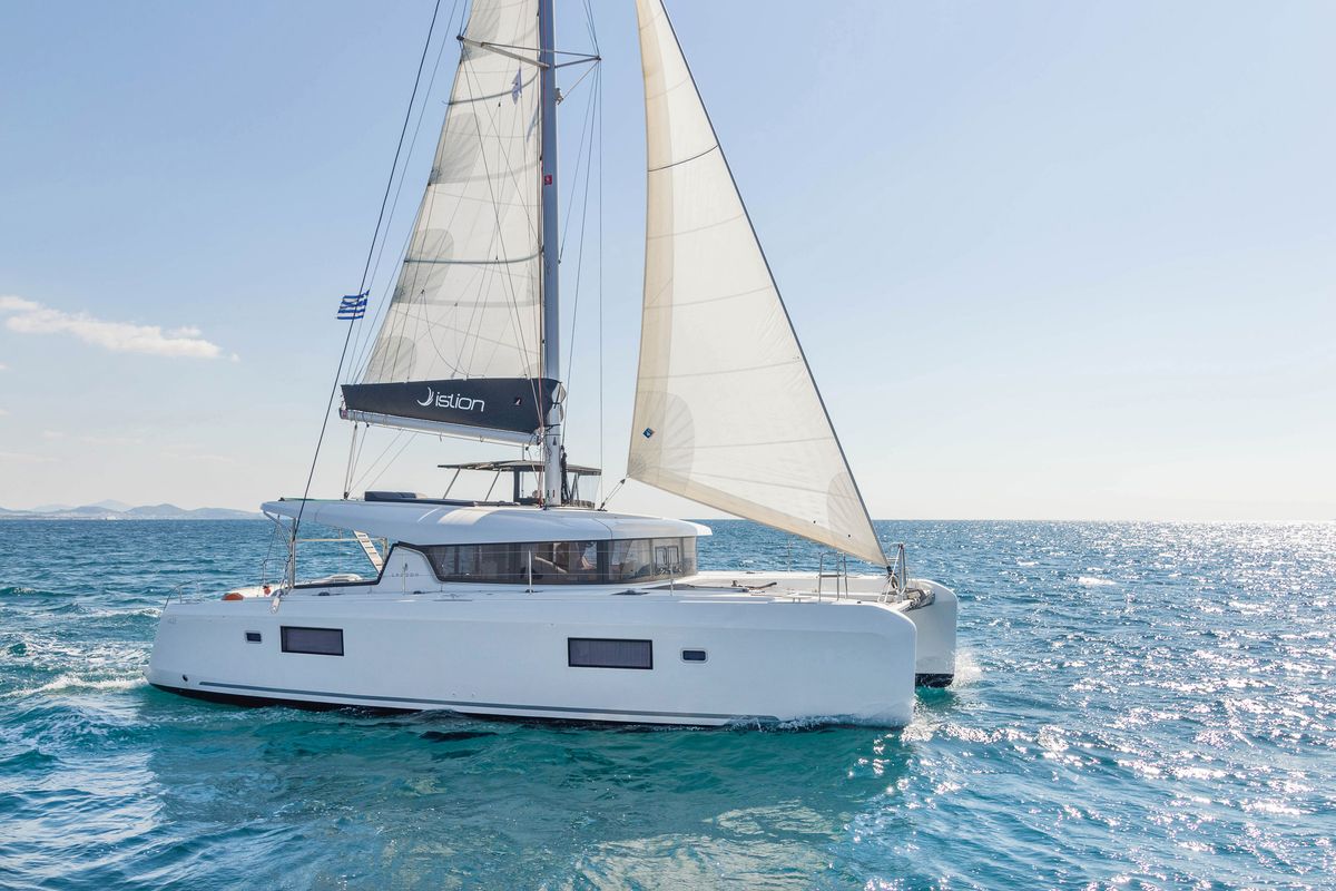 Exterior view of Wind Whisper, a Lagoon 42 catamaran at Parikia, Greece