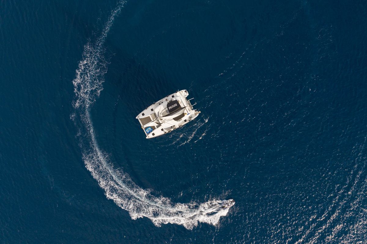 Exterior view of MADICON, a Lagoon 450 Fly catamaran at Thira Municipal Unit, Greece