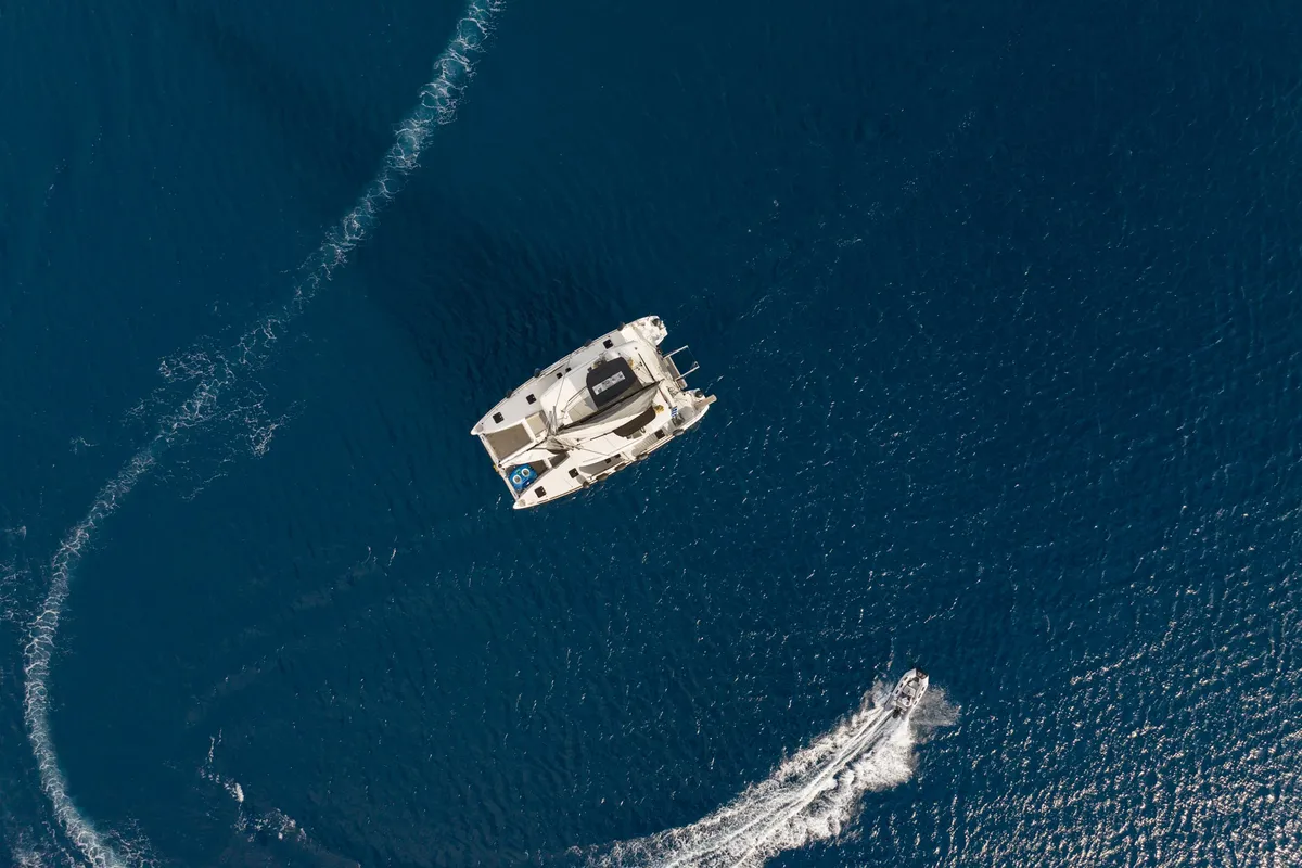 Exterior view of MADICON, a Lagoon 450 Fly catamaran at Thira Municipal Unit, Greece