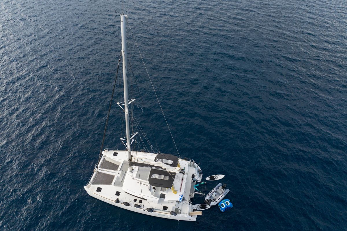 Exterior view of MADICON, a Lagoon 450 Fly catamaran at Thira Municipal Unit, Greece
