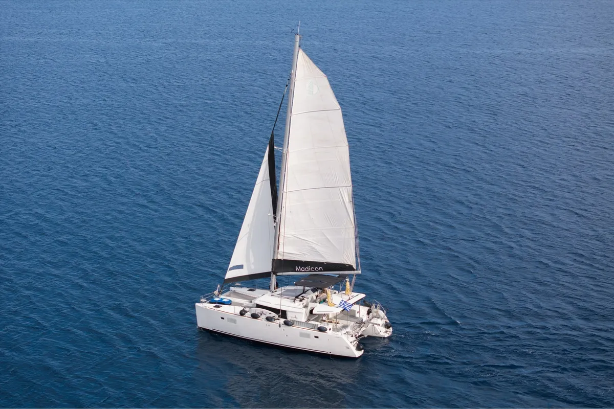 Exterior view of MADICON, a Lagoon 450 Fly catamaran at Thira Municipal Unit, Greece