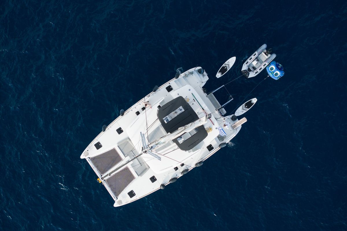 Exterior view of MADICON, a Lagoon 450 Fly catamaran at Thira Municipal Unit, Greece