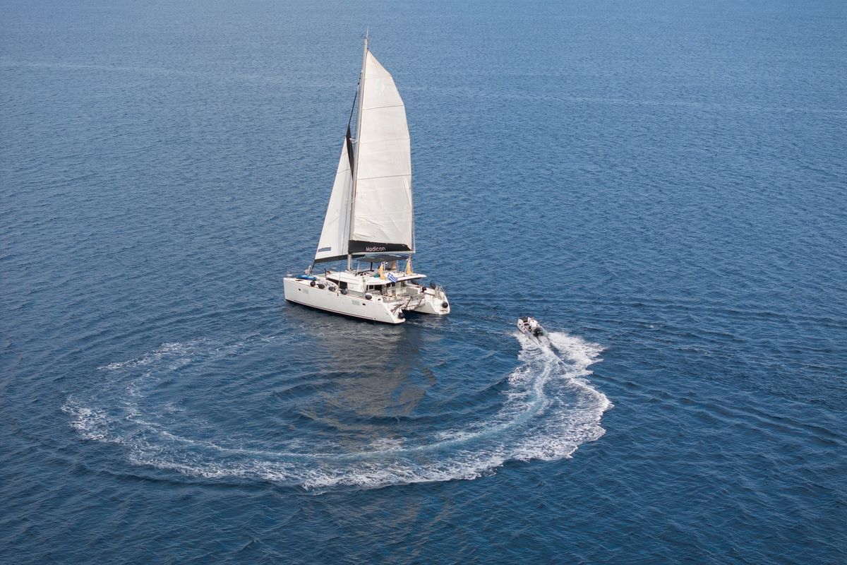 Exterior view of MADICON, a Lagoon 450 Fly catamaran at Thira Municipal Unit, Greece