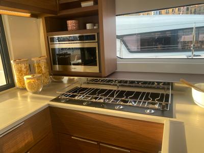 Galley of Invalid, a Lagoon 46 catamaran at Sant Antoni de Portmany, Spain