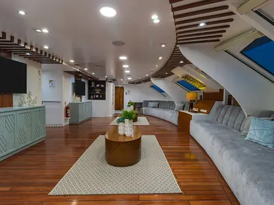 Salon of Ocean Spray, a Gulet Power Catamaran catamaran at Baltra, Ecuador