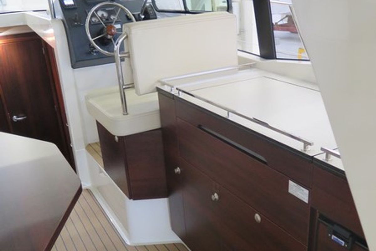 Cockpit of Platinum 989 Flybridge, a Delphia Yachts Platinum 989 motorboat at Wilkasy, Poland