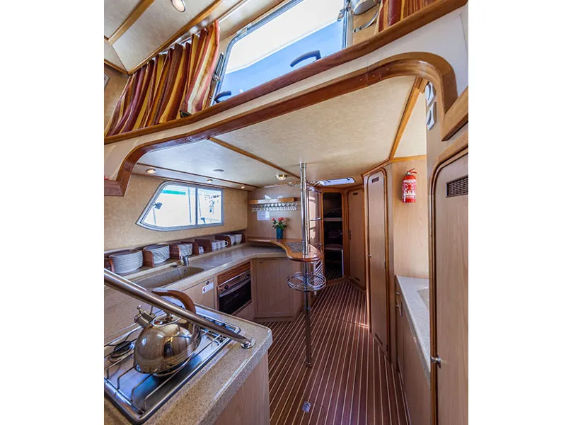 Galley of 150FB-16, a Pénichette 1500FB motorboat at Lattes, France