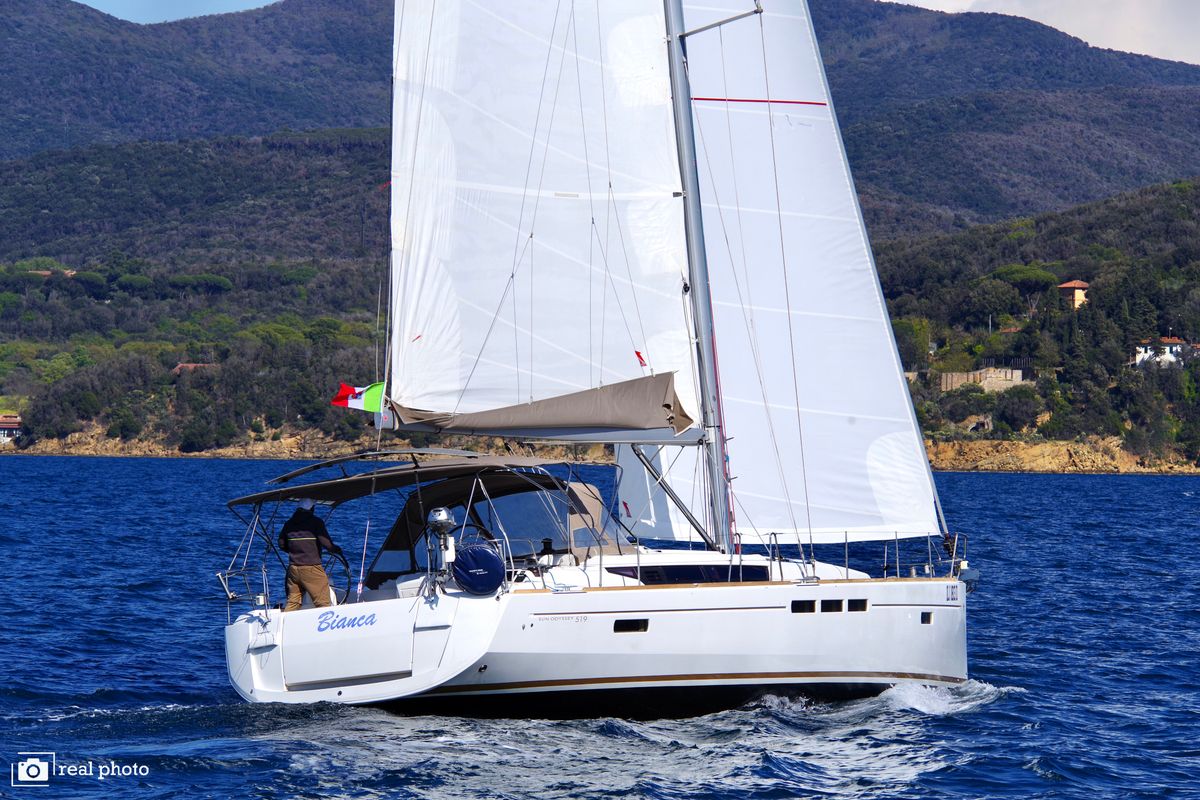 Exterior view of Bianca - Water maker, Solar Panel, a Jeanneau Sun Odyssey 519 sailboat at Puntone di Scarlino, Italy