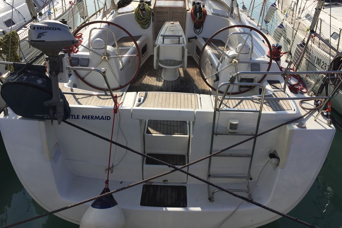 Exterior view of Little Mermaid, a Beneteau Oceanis 43 sailboat at Olbia, Italy