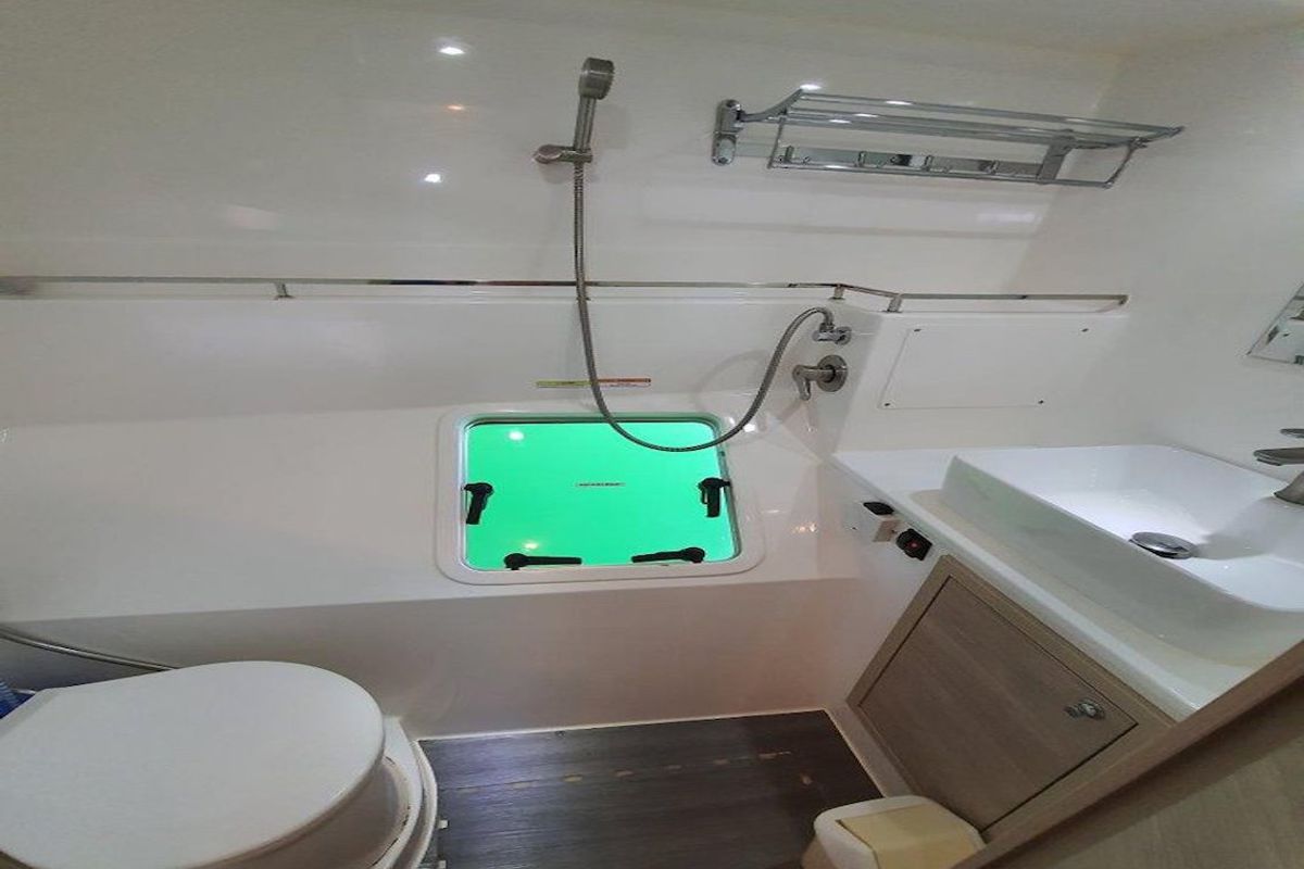 Head on Fortunate Sun, a Island Spirit Yachts Island Spirit 410 catamaran at Mai Khao, Thailand