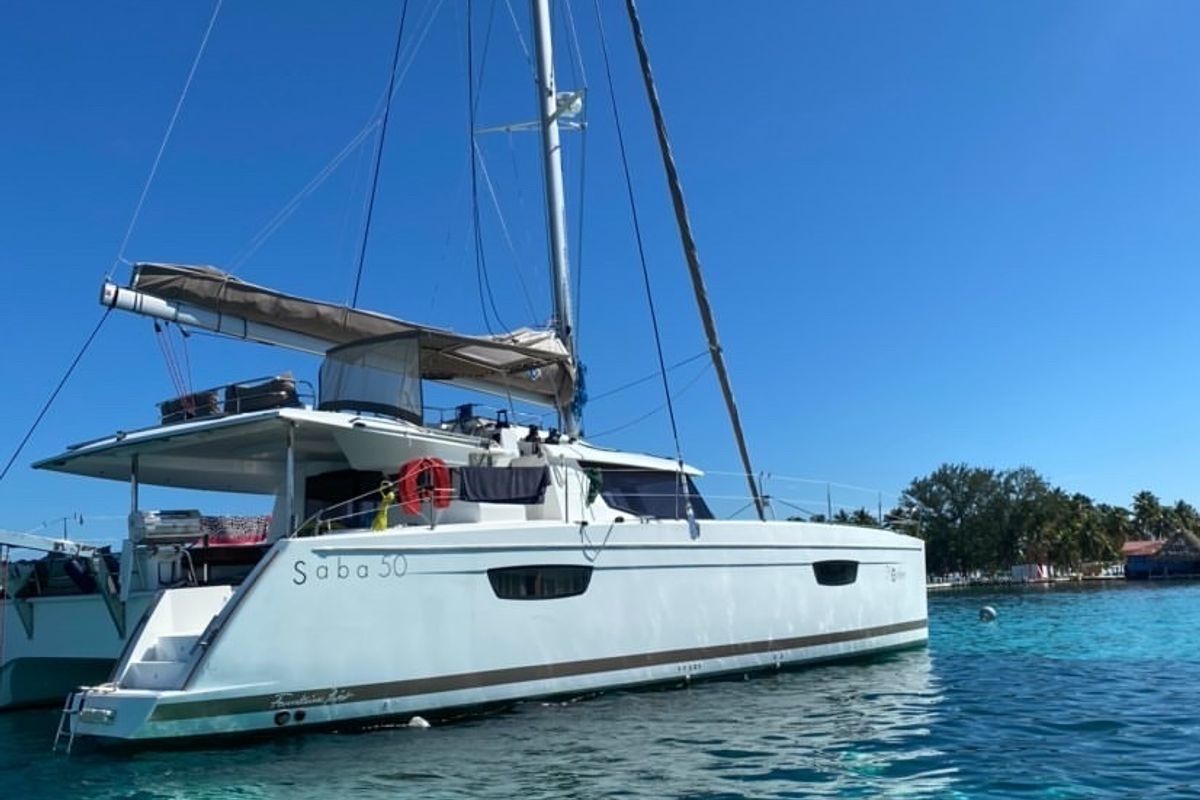 Exterior view of Nowhere, a Fountaine Pajot Saba 50 Quintet catamaran at Belize City, Belize