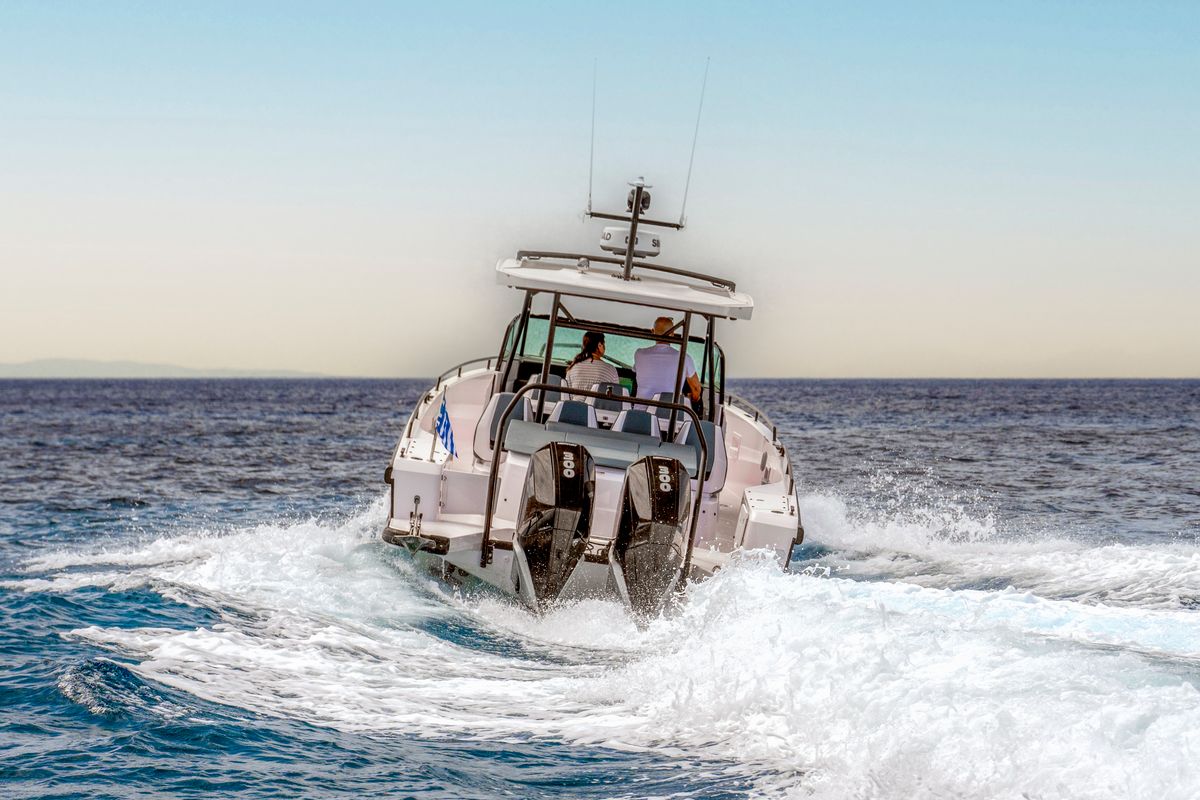 Exterior view of PARALOS, a Axopar 37 Sun Top motorboat at Lavreotiki Municipal Unit, Greece