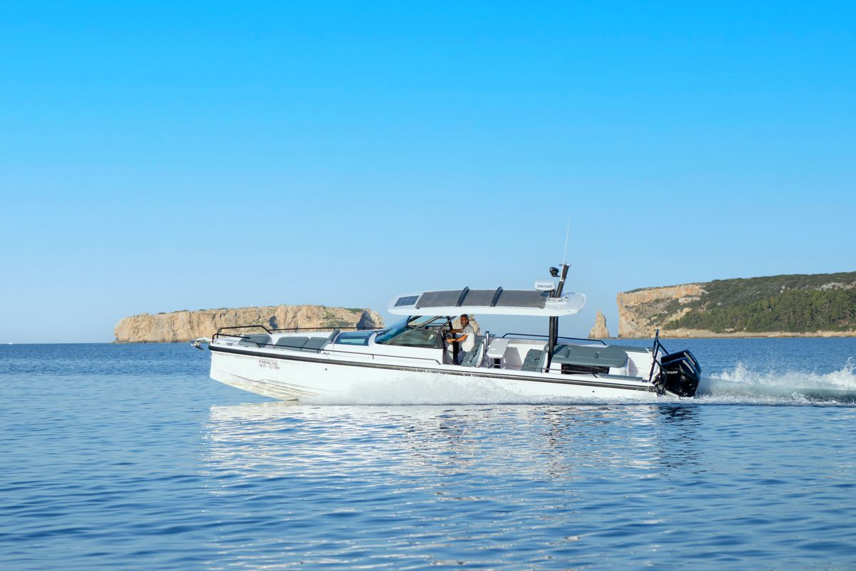 Exterior view of PARALOS, a Axopar 37 Sun Top motorboat at Lavreotiki Municipal Unit, Greece