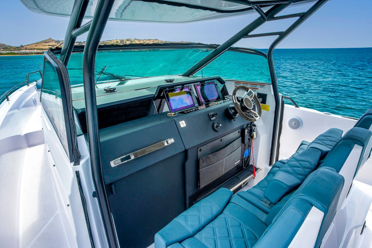 Cockpit of PARALOS, a Axopar 37  Sun Top motorboat at Lavreotiki Municipal Unit, Greece